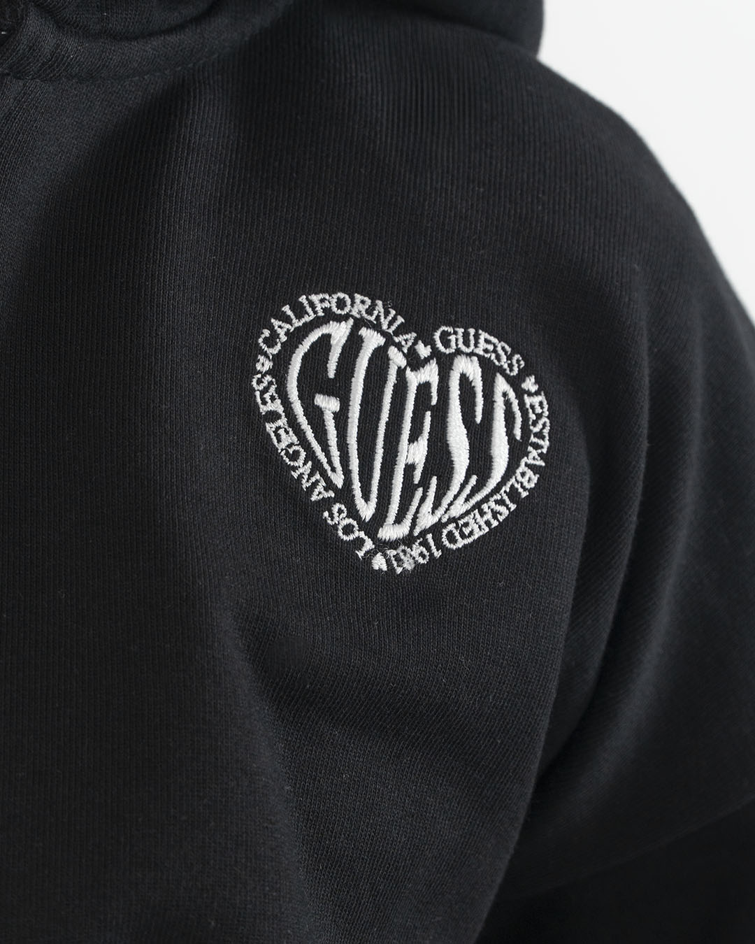 Felpa corta a peso medio con zip e cappuccioGUESS