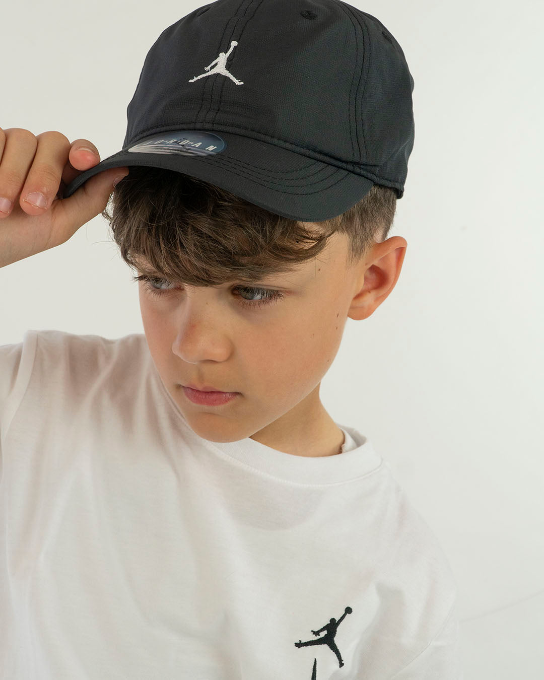 Cappello con visiera e logo JORDAN