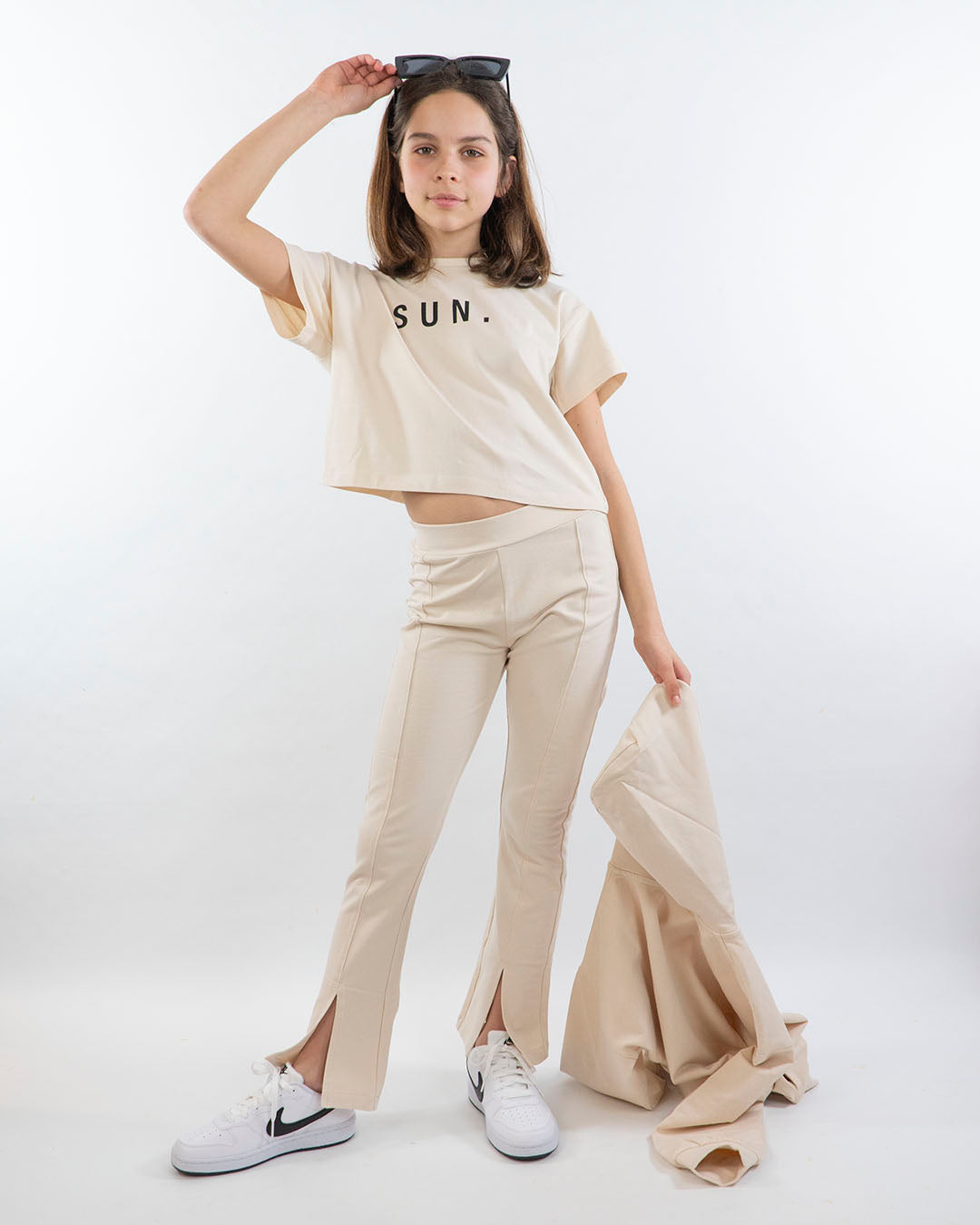 Pantaloni lunghi a zampa con spacco