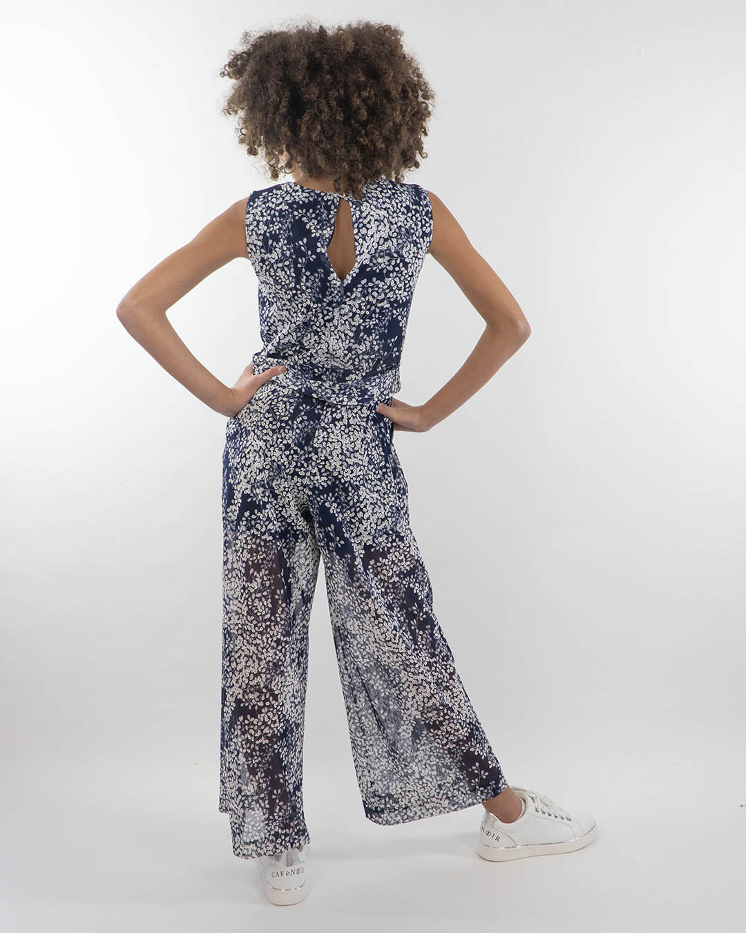 Tuta smanicata in tessuto operato KOCCA