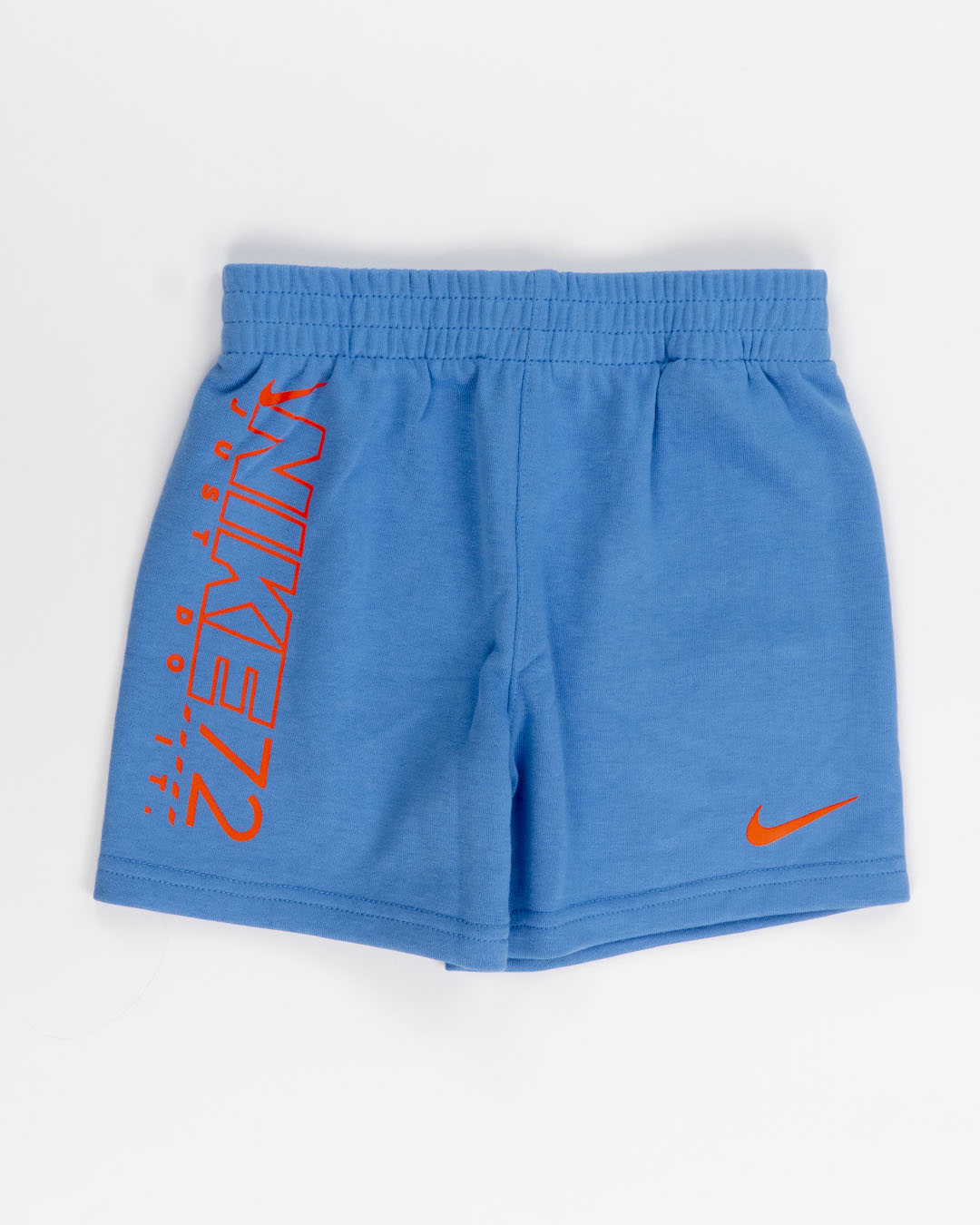 Completo 2 pz. con pantaloncino azzurro NIKE