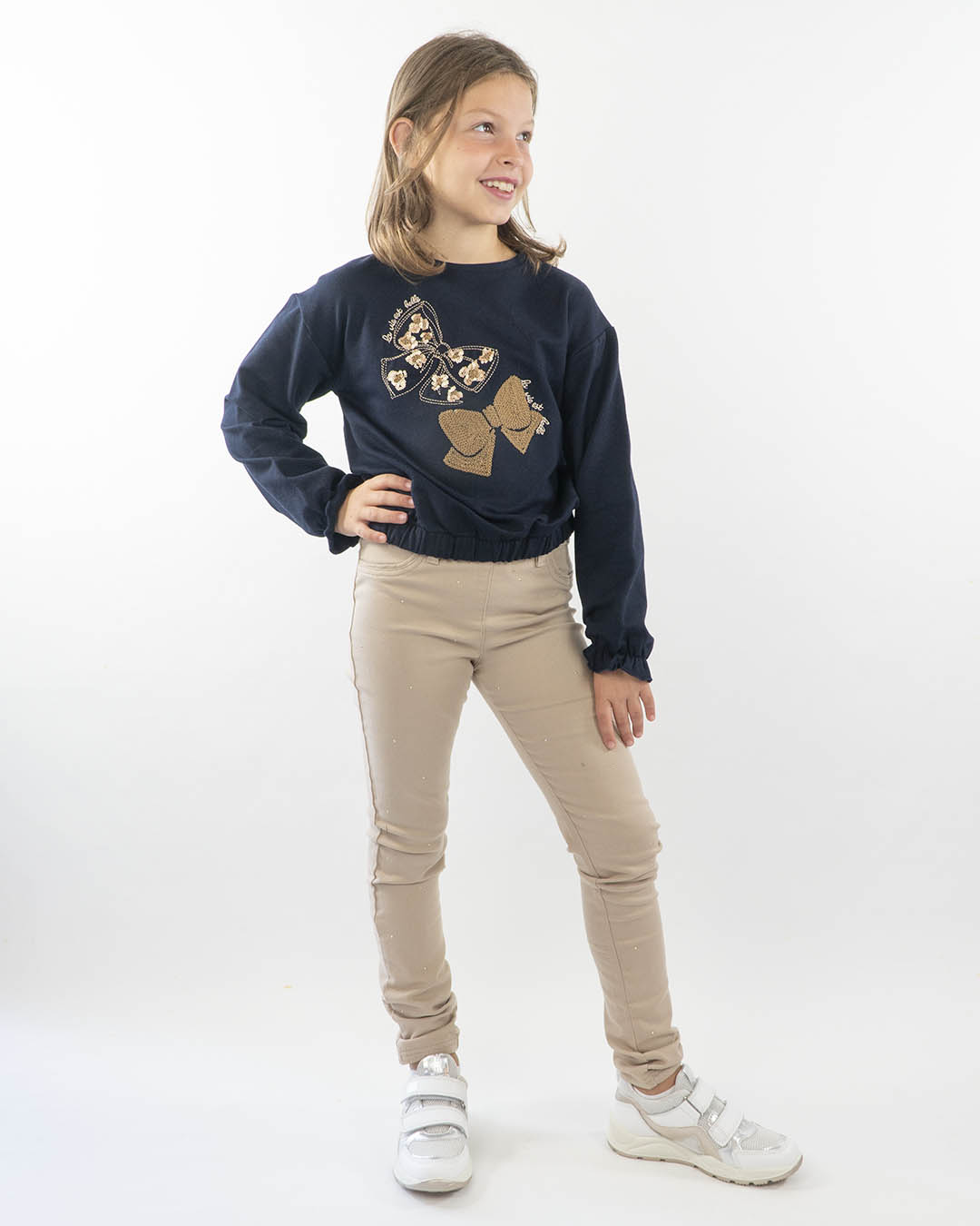 Pantalone con borchiette