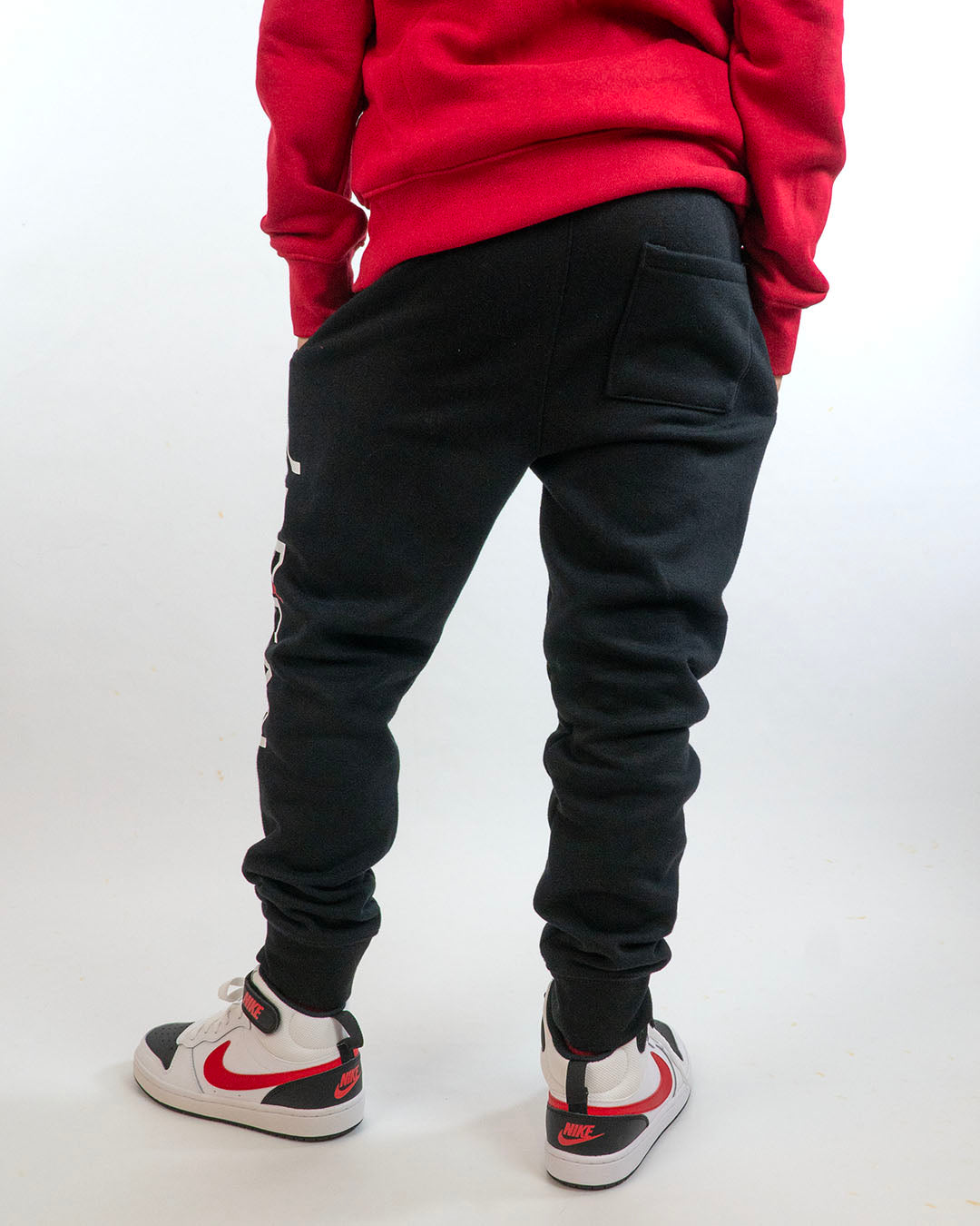 Pantaloni felpati con scritta laterale JORDAN