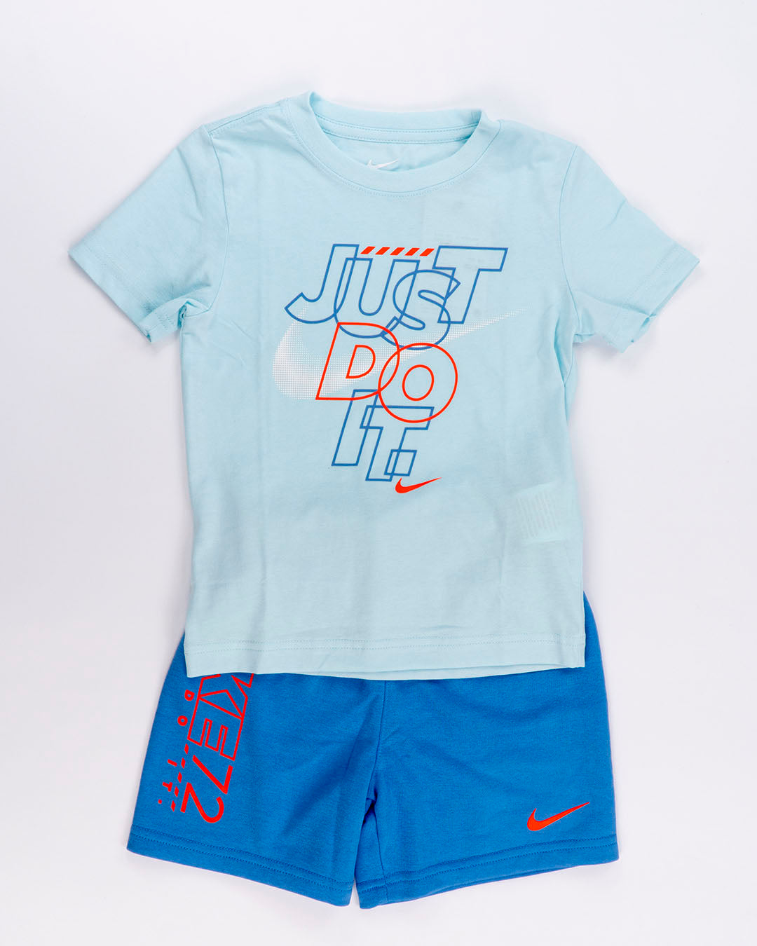 Completo 2 pz. con pantaloncino azzurro NIKE