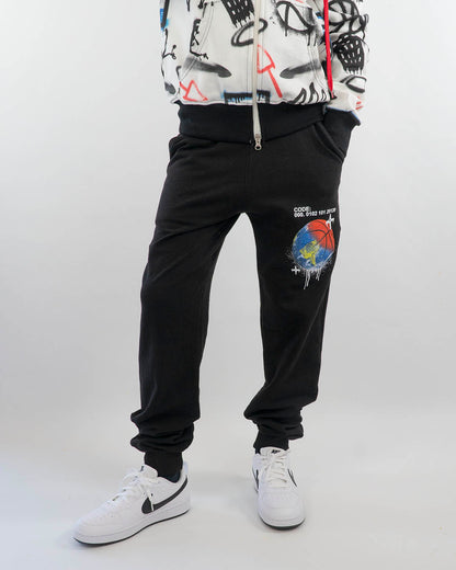 Pantaloni felpati con palla-mondo NEVER GIVE UP