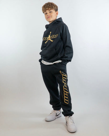 Pantaloni felpati con scritta e logo dorati JORDAN