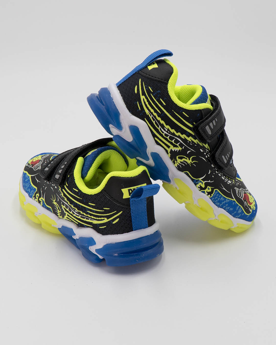 Scarpe in tessuto con luci e strappi