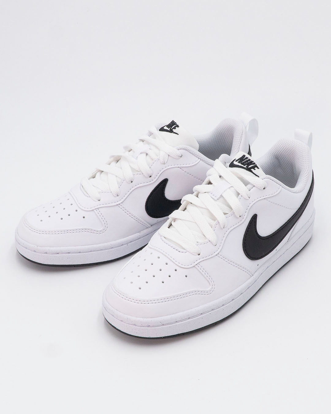 Scarpe bianche con swoosh nero NIKE