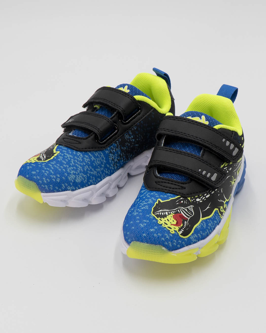 Scarpe in tessuto con luci e strappi