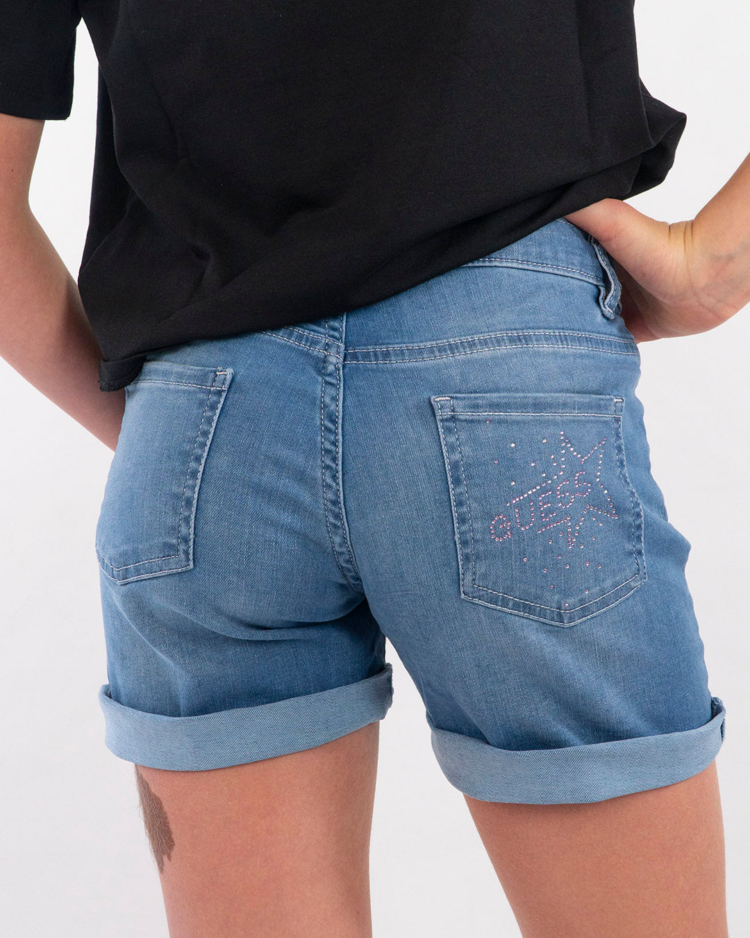 Shorts in Jeans con bottoni fucsia GUESS