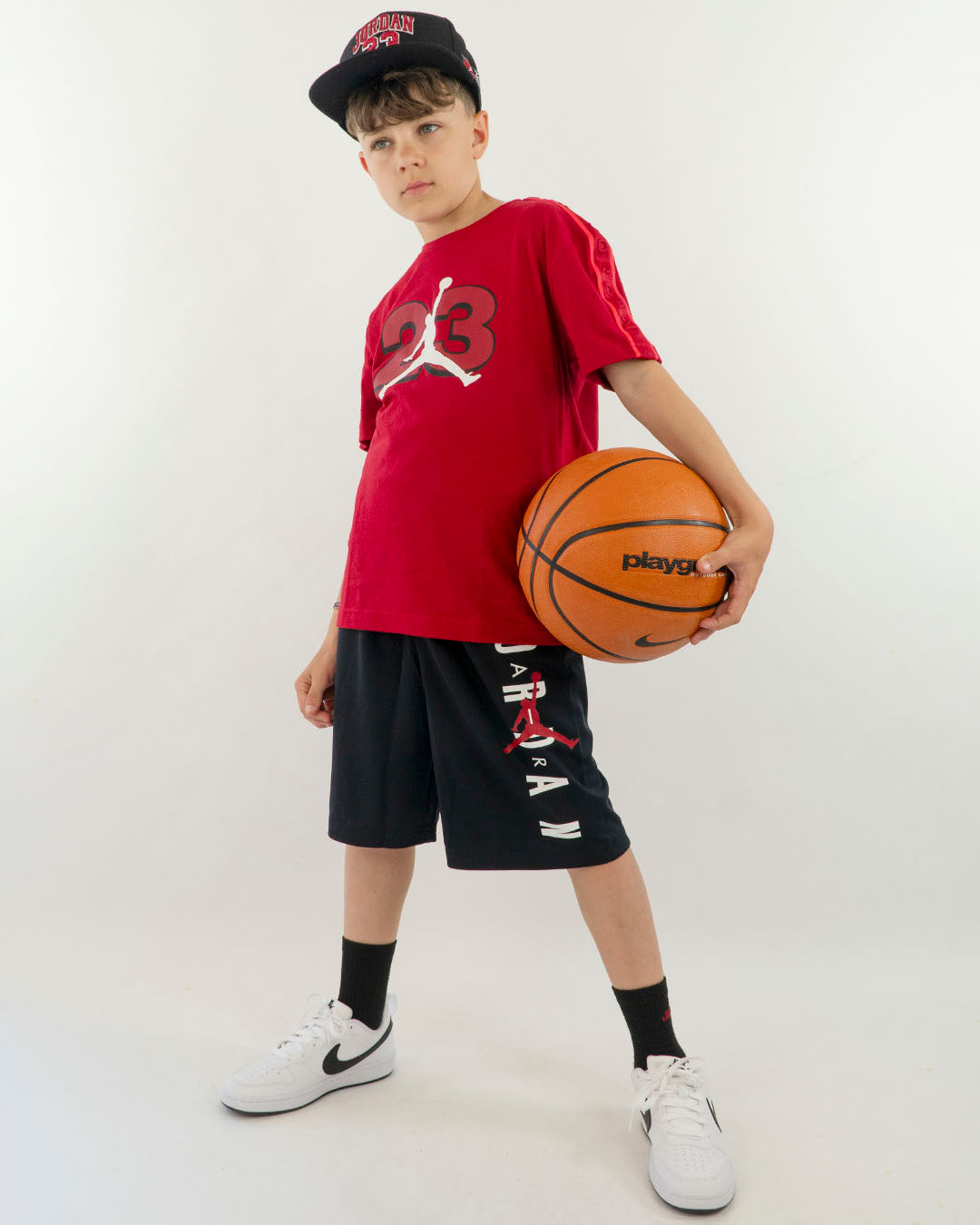 Pantaloncino in tessuto tecnico con scritta JORDAN