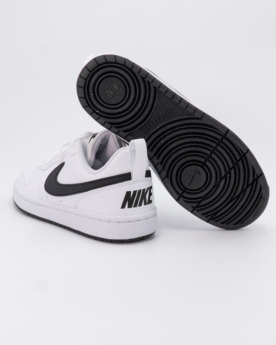 Scarpe bianche con swoosh nero NIKE