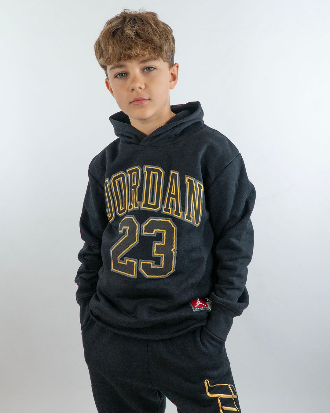 Felpa chiusa felpata con scritta dorata JORDAN