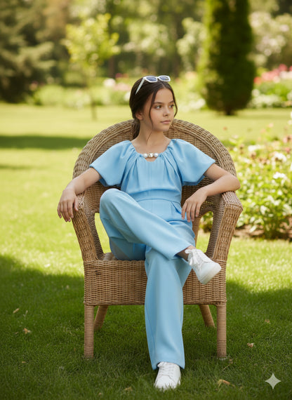 Tuta con manica a sbuffo e perle ABEL & LULA