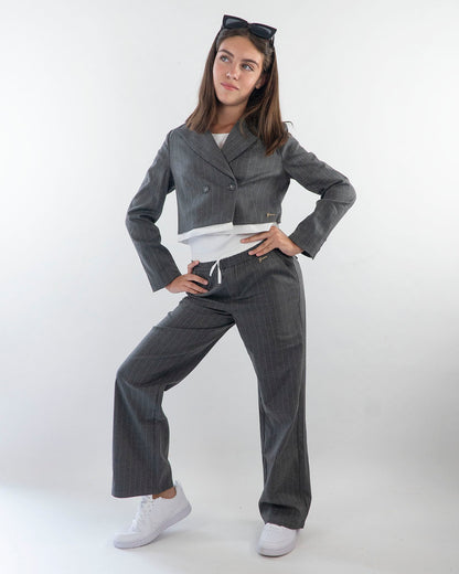 Pantaloni larghi gessati con elastico in vitaGUESS