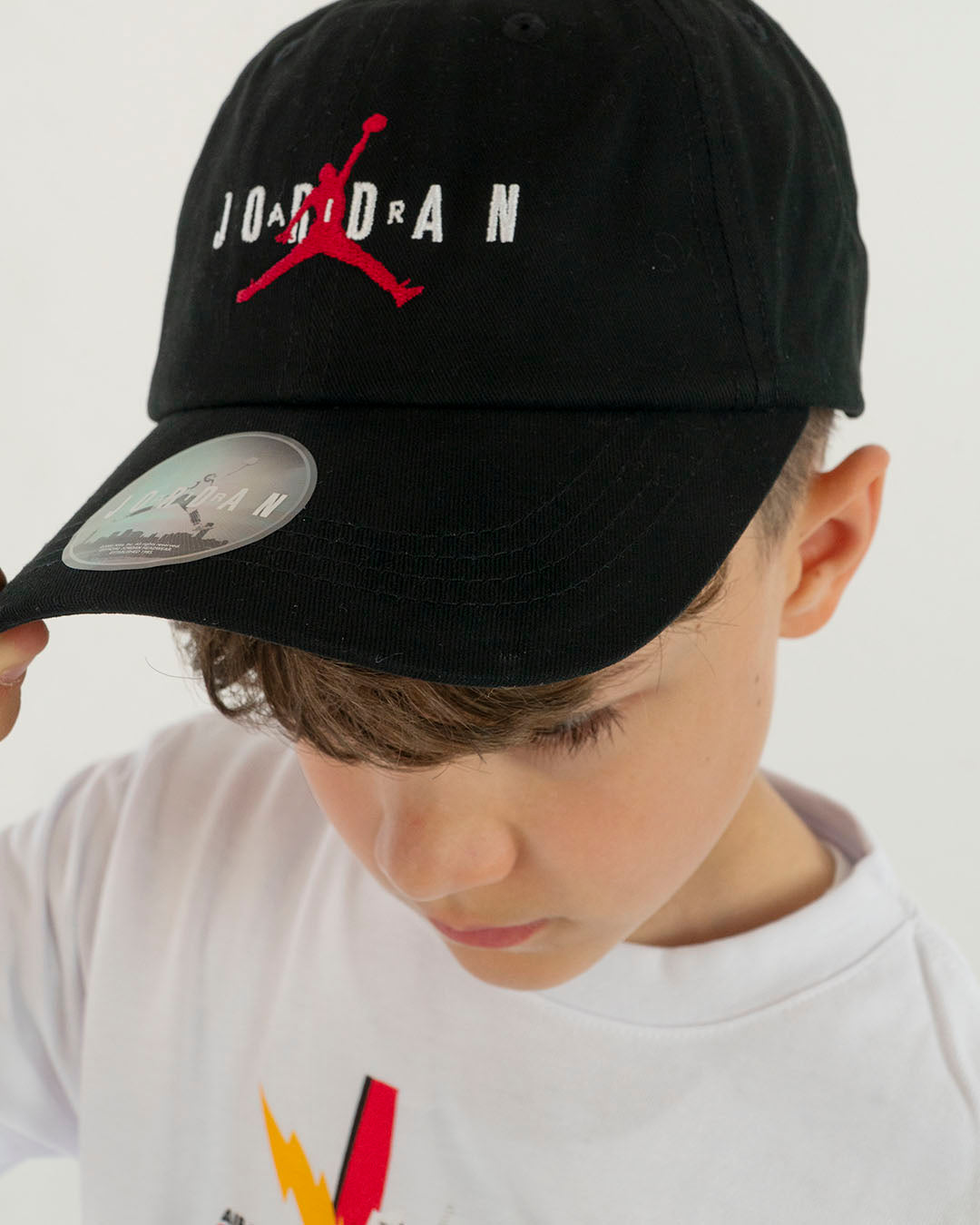 Cappello con visiera e logo JORDAN