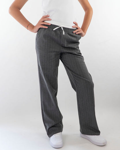 Pantaloni larghi gessati con elastico in vitaGUESS