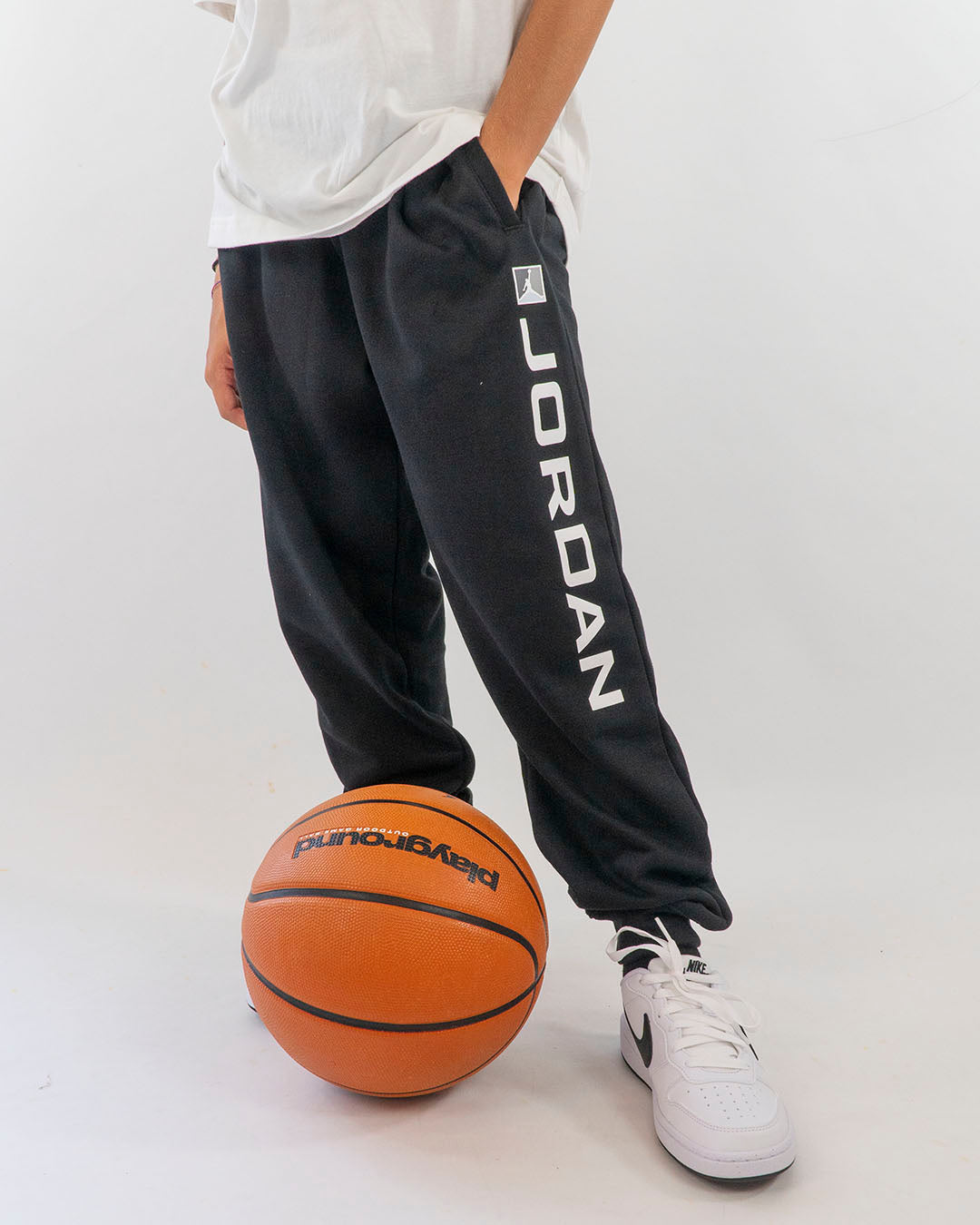 Pantaloni felpati con scritta gommata JORDAN