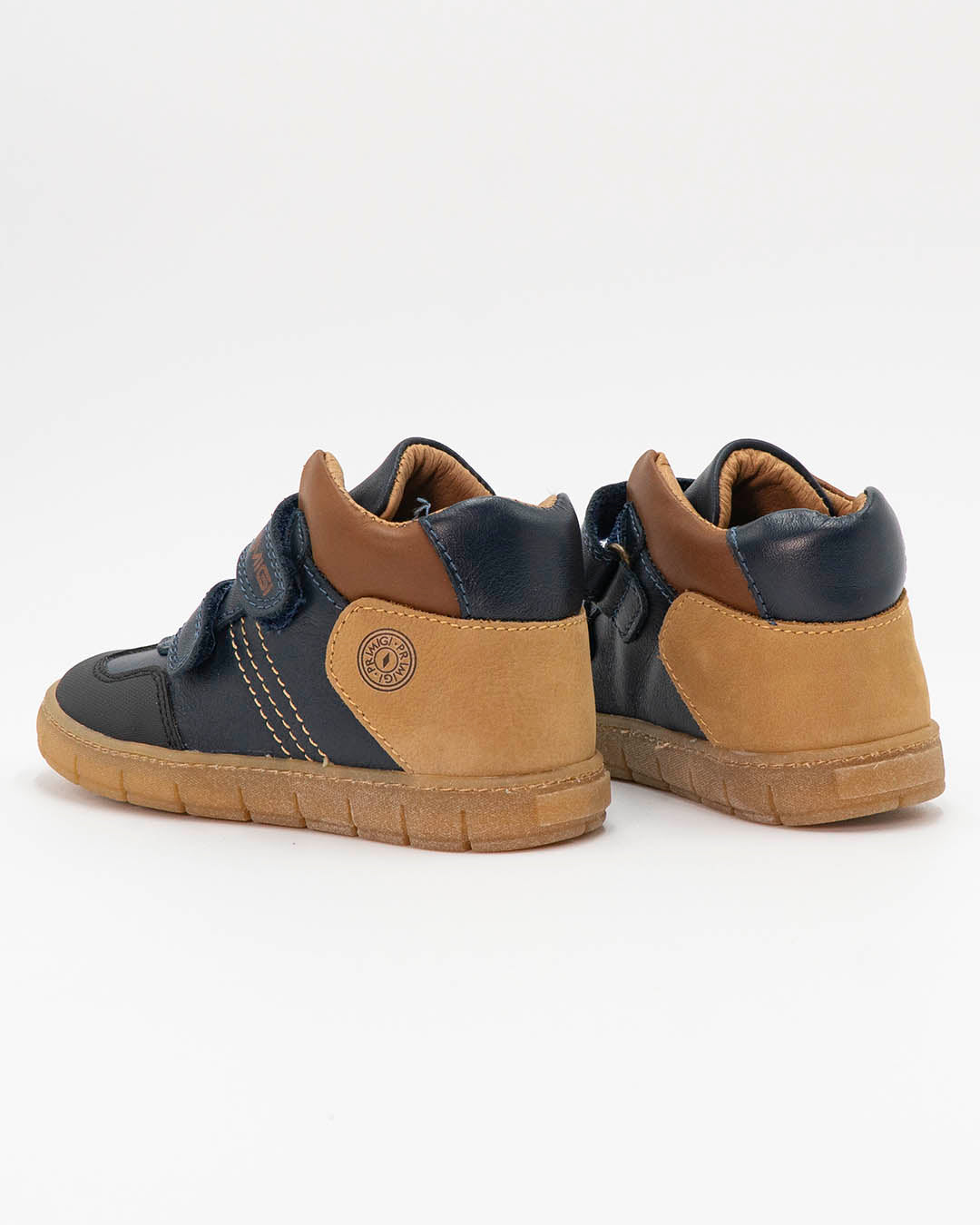 Scarpe bicolor con strappi